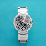 Front view of a Cartier Ballon Bleu W69012Z4 watch featuring a polished stainless steel case, 42mm size, and a diamond panther MOP dial and blue sword-shaped hands.