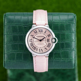 Front view of a Cartier Ballon Bleu WSBB0007 watch, featuring a polished stainless steel case, 36mm size, and signature blue cabochon crown.