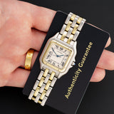 Front view of a Cartier Panthere 83957 watch featuring a stainless steel and yellow gold case, measuring 29mm in size.