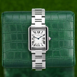 Front view of a Cartier Tank Solo W5200013 watch featuring a stainless steel case, measuring 31mm by 24.4mm, with a classic white dial and black Roman numeral hour markers.
