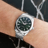 Front view of an Omega Aqua Terra 220.10.38.20.10.003 watch featuring a polished stainless steel case, 38mm size, and a clean white dial with contrasting hour markers and hands.