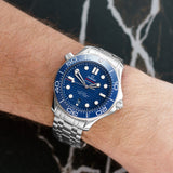 Front view of an Omega Seamaster Professional 210.30.42.20.03.001 watch featuring a stainless steel case and a 42mm size, showcasing its sleek design and classic dive watch details.