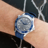 Front view of an Omega Seamaster Professional 210.32.42.20.06.001 watch featuring a stainless steel case, 42mm size, blue dial, and stainless steel bracelet.