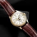 Front view of a Patek Philippe Annual Calendar 5146J watch featuring a yellow gold case, 39mm size, and a white dial with date and month displays.