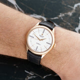 Front view of a Rolex Cellini 50505 watch featuring a polished rose gold case and a 39mm diameter. The elegant dial showcases minimalist hour markers and a classic design.