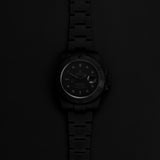 Front view of a Rolex Submariner Date PVD 116610LN, featuring a sleek black dial, luminous hour markers, and a stainless steel case with a 40mm diameter.