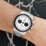 Front view of a Tudor Black Bay Chronograph 79360N watch featuring a stainless steel case, 41mm size, and a black dial with chronograph sub-dials.