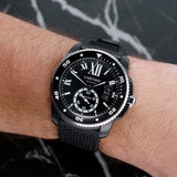 Front view of a Cartier Calibre WSCA0006 watch featuring a stainless steel case, 42mm size, with a classic dial and elegant design.