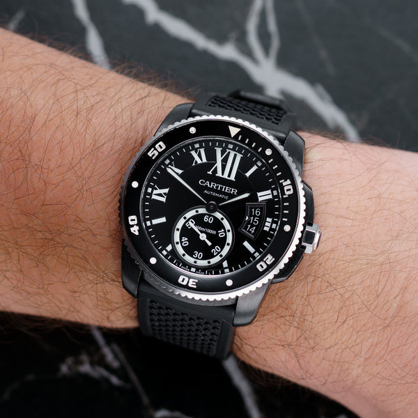 Front view of a Cartier Calibre WSCA0006 watch featuring a stainless steel case, 42mm size, with a classic dial and elegant design.