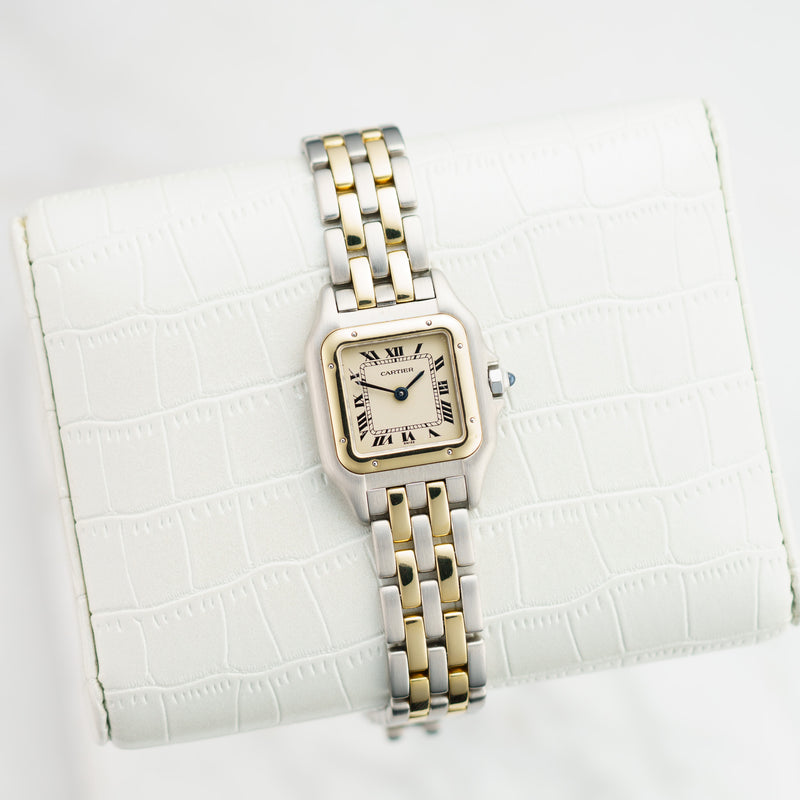 Front view of a Cartier Panthere Small 166921 watch featuring a stainless steel and yellow gold case, measuring 22mm by 30mm.