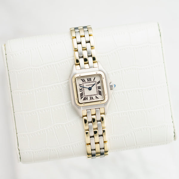 Front view of a Cartier Panthere 112000R watch featuring a stainless steel and yellow gold case, measuring 22mm by 30mm.