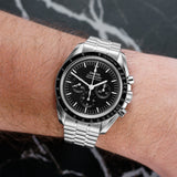 Front view of an Omega Speedmaster 310.30.42.50.01.002 watch featuring a stainless steel case, 42mm size, with a black dial and silver-tone hands.