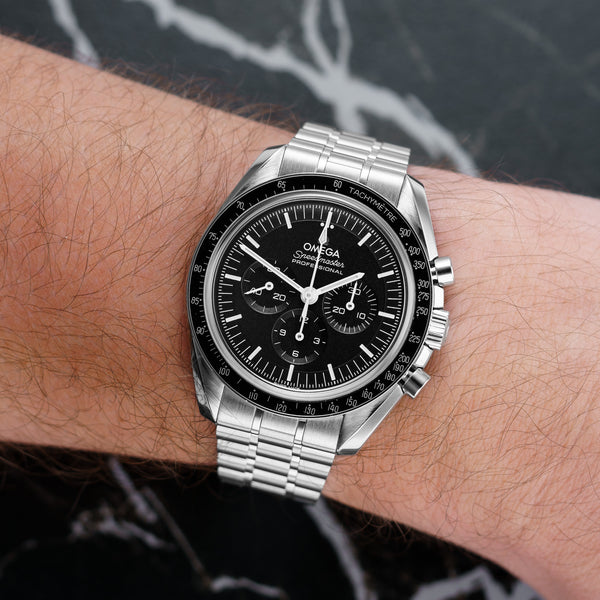 Front view of an Omega Speedmaster 310.30.42.50.01.002 watch featuring a stainless steel case, 42mm size, with a black dial and silver-tone hands.