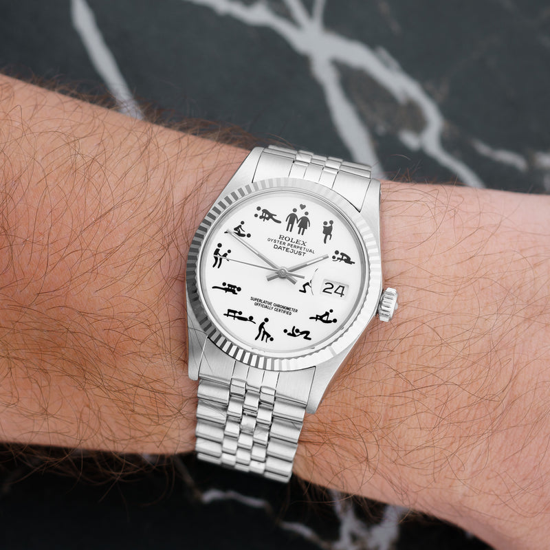 Front view of a Rolex Datejust 16014 featuring a stainless steel case, 36mm size, and a classic silver dial with date display.
