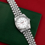 Front view of a Rolex Datejust Turnograph 116264 featuring a stainless steel case, 36mm size, and a silver dial with luminous markers.