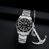 Front view of a Rolex Seadweller SD4K 116600, featuring a stainless steel case, 40mm size, and a black dial with luminous markers and a date function.
